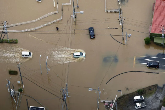 At least four people dead and thousands stranded after 'unprecedented' heavy rain in Japan