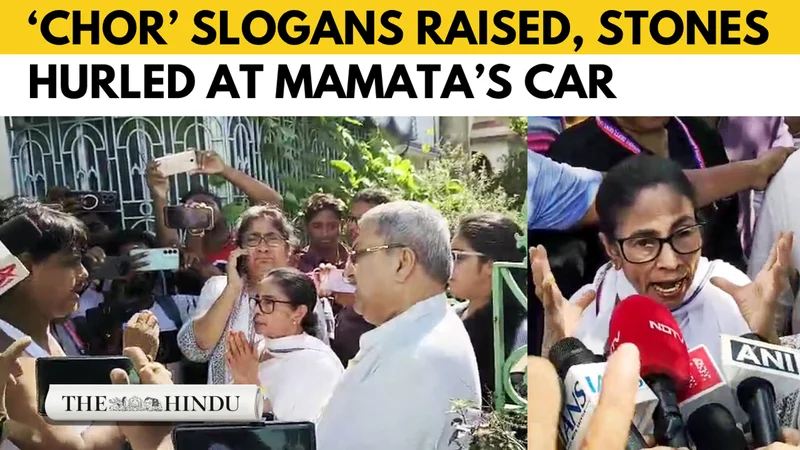 Mamata Banerjee faces ‘chor’ slogans, protesters smear mud on car