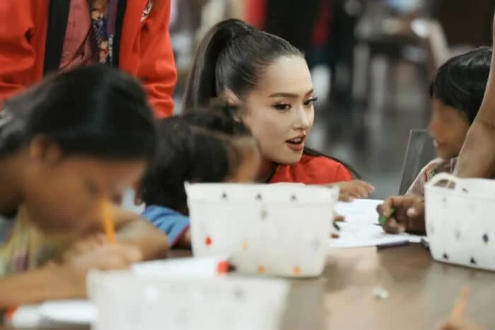 Katrina Johnson celebrates International Youth Day with underprivileged kids