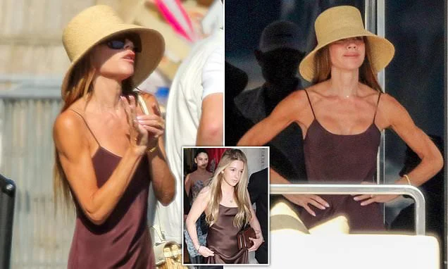 Victoria Beckham, 52, wows in stylish brown satin dress as she takes fashion inspiration from daughter Harper's wardrobe as family head into St Tropez amid £16M luxury yacht holiday