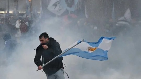 Protesters clash with police in Buenos Aires over private property bill