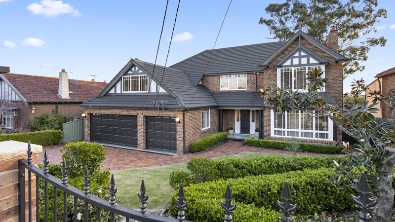 Sydney home sells at a $345,000 loss as auction market tanks