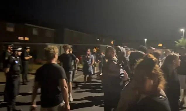 Historic market town plunged into night of violence as angry mobs storm three houses believed to have asylum seekers