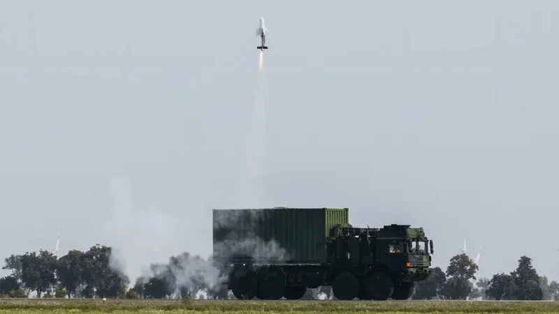 German defense giant tests moving truck launcher carrying 18 kamikaze drones