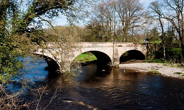 Probe launched after remains of an unborn baby are found in a bag under a bridge in Lancashire