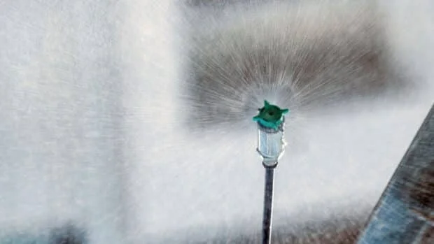 Cotabato family beats heat with rooftop sprinklers