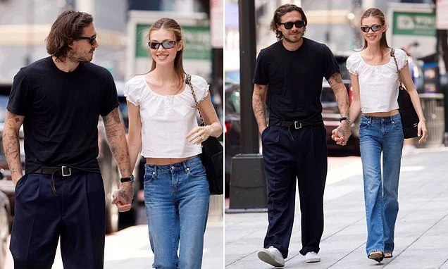 Brooklyn Beckham and wife Nicola Peltz look loved-up as they return to NYC just days after nearly running into estranged parents David and Victoria in St Tropez