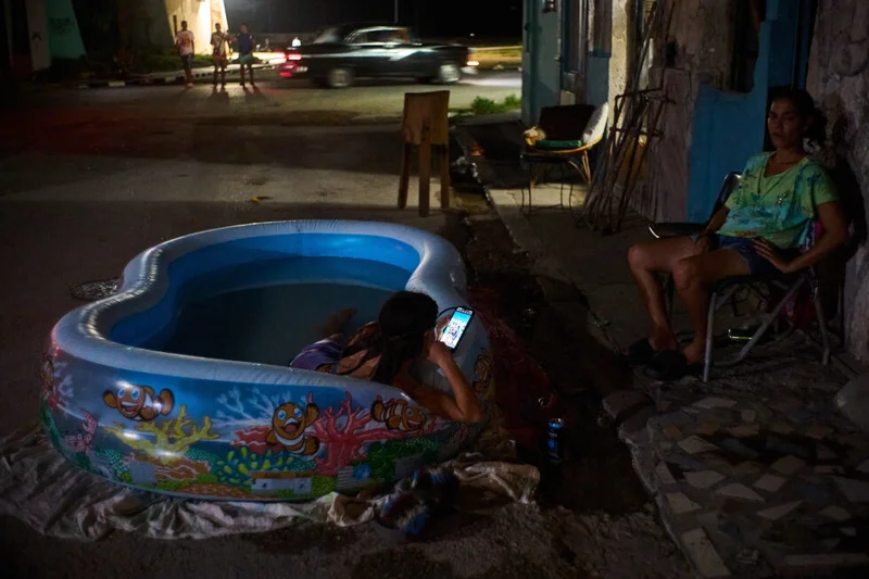 As blackouts stretch for days, life in Cuba revolves around small bursts of electricity