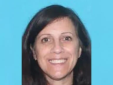 Arrest warrant issued for wife of off-duty Massachusetts cop found dead in home