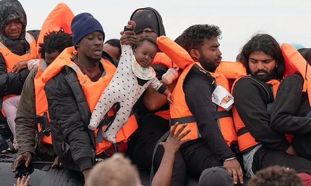 Britain has taken in the blameless baby recklessly hauled onto a small boat this week - so how much will our compassion cost us in the decades to come?