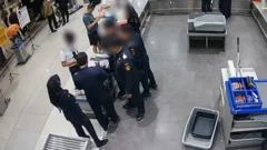 Moment pilot caught with 70,000 ecstasy pills at Indonesian airport