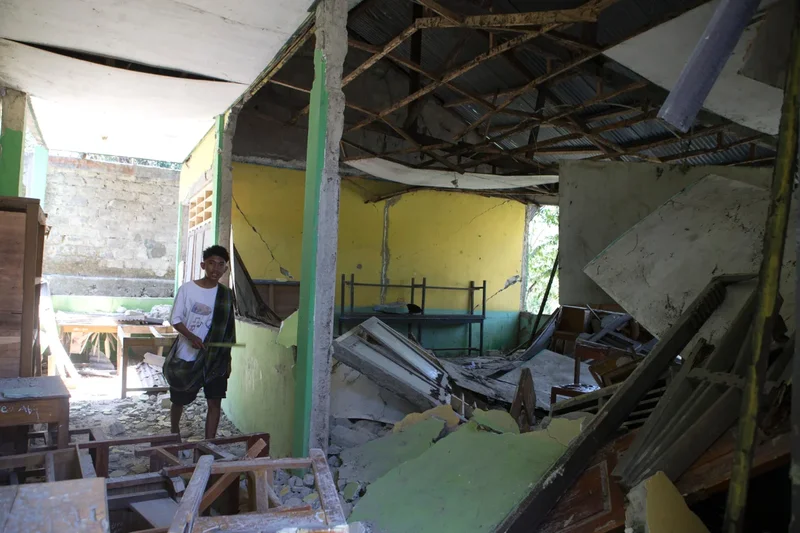 Powerful aftershock hits Indonesian communities still waiting for aid as earthquake death toll rises to 54