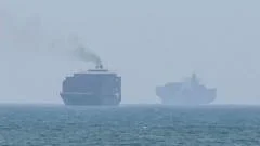 Hormuz talks positive, Oman says, as Iran warns deal would not open strait