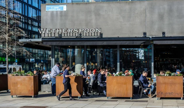 Wetherspoons bans customers from playing music out loud and taking calls on speaker