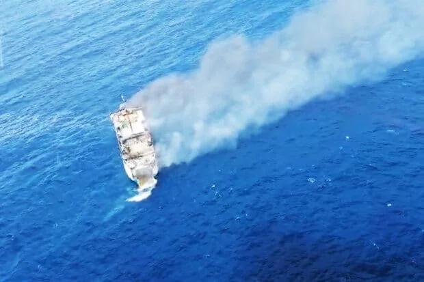 Rescuers comb waters near Bali for 5 missing after ferry blaze