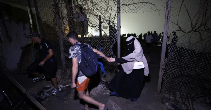 Migrants depart Spain's N. Africa enclave as EU tightens borders