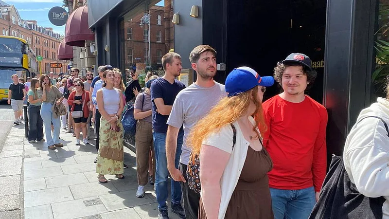 Hundreds queue on George's Street in Dublin to buy glasses to watch rare eclipse