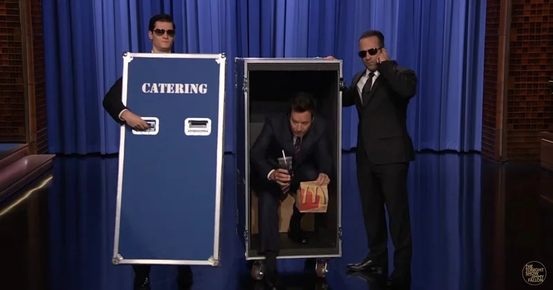 Jimmy Fallon Recreates Trump’s Catering Container Escape