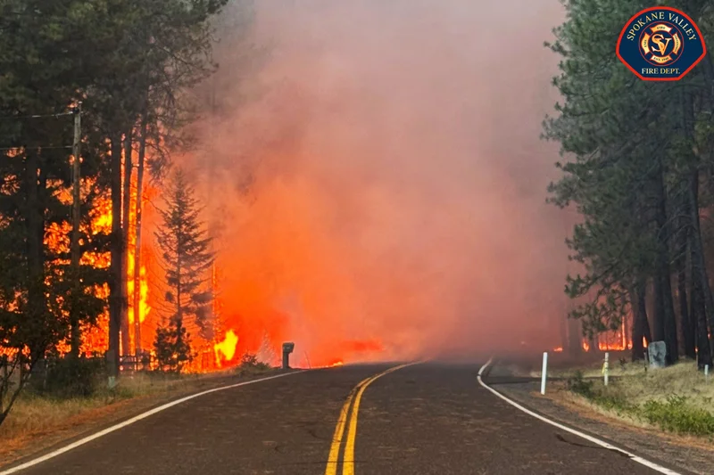 Wildfires near Spokane destroy more than 700 buildings, force 64,000 to flee