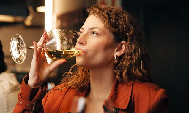 Flushed face, a racing heart, throbbing headaches - even after one sip of wine: Millions can't 'hold their drink' and this is why... Now a pill is on the way that could ease symptoms and hangovers too