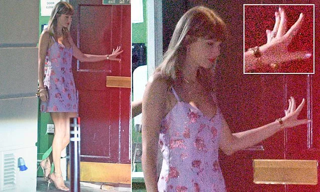 Taylor Swift debuts new wife look as she steps out solo after Travis broke silence on 'crazy' wedding... and insiders spot 'major clue' about what's REALLY going on
