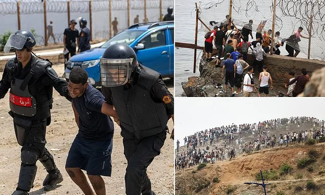 Morocco deploys hundreds of troops to the border over fears another huge migrant 'invasion' of Ceuta is imminent