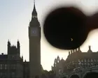 Solar eclipse visible over Houses of Parliament and Big Ben in London – video