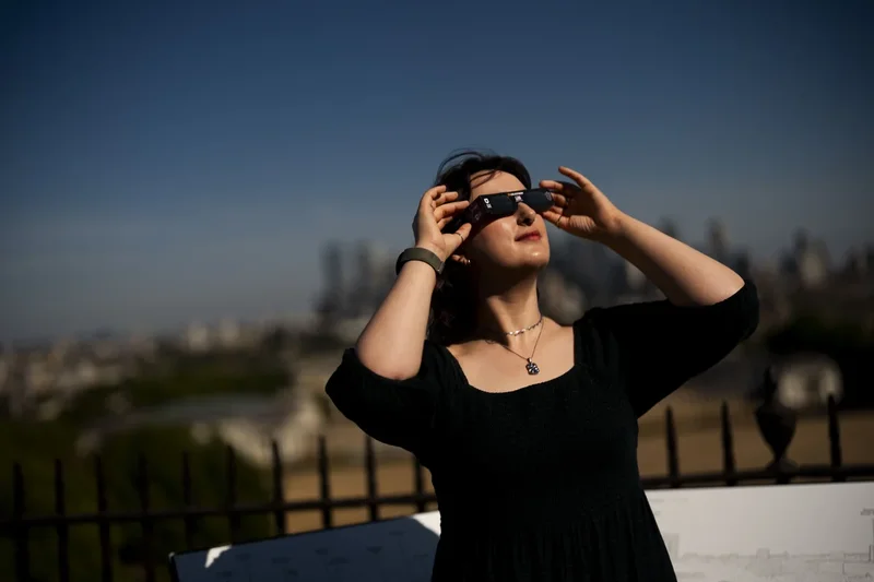 How can I watch the partial solar eclipse safely?