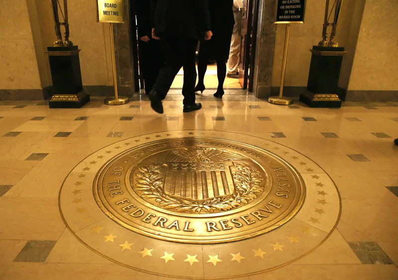Treasury yields are little changed as investors await key inflation data