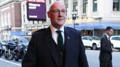John Swinney defends £45,000 business-class flights to World Cup