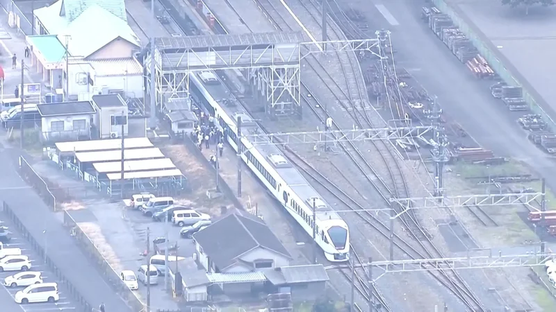 Four railway workers killed by express train at station in Japan
