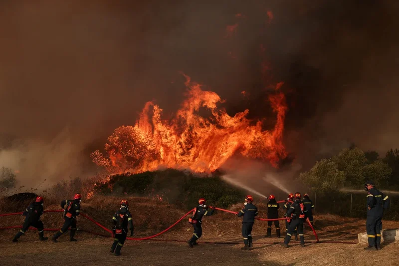 Thousands evacuated in Greece as wildfires burn for a fifth day