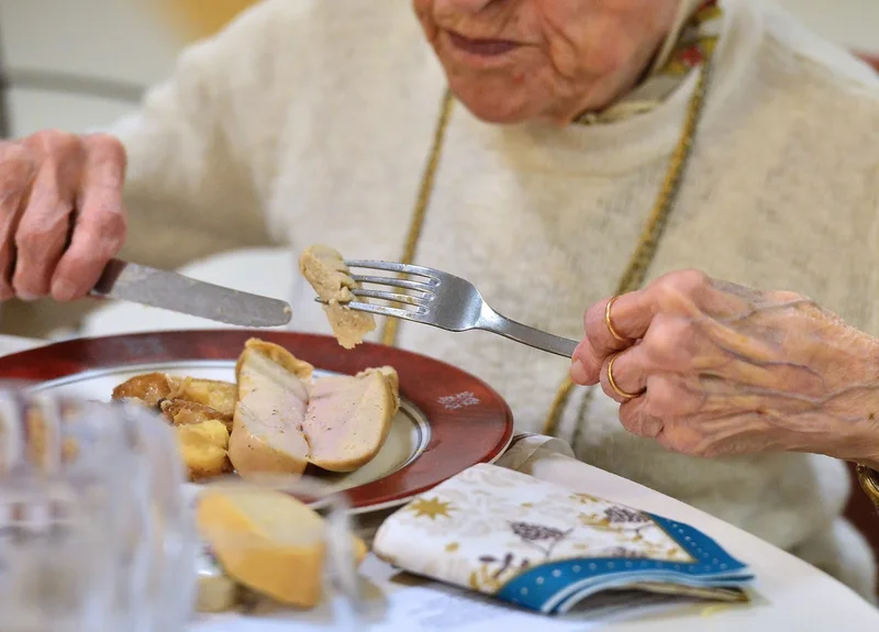 Carers fed dog food to frail elderly woman and left her in the darkness for prolonged periods