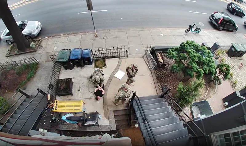 A veteran was detained by the National Guard in her front yard. Now she's suing
