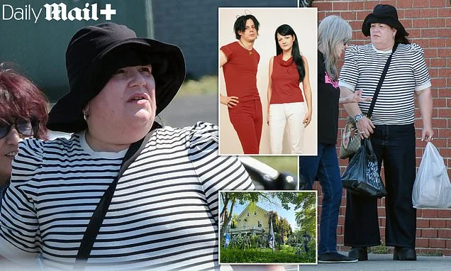 Mysterious mansion covered in spiders and skeletons is talk of ritzy suburb. Now its owner is revealed as reclusive female music megastar pictured for first time in 17 YEARS... see her secret new life
