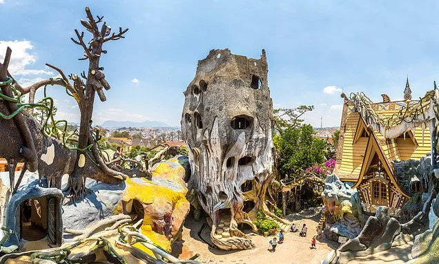 Would YOU stay here? The world's ugliest hotels - from bizarre pyramids to a bright yellow eyesore and Britain's 'worst'