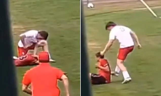 Disgusting moment high school soccer player punches and kicks rival in the head... prompting calls for him to be banned for LIFE