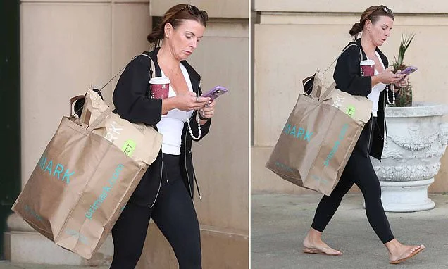 Coleen Rooney carries huge haul from Primark as she swaps her designer wardrobe for the high street after landing multi-million pound campaign with them