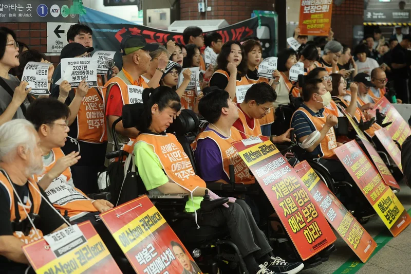Activist group says will halt subway protest on gov't pledge to review disability rights budget