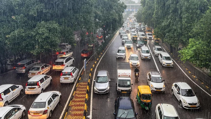 IMD issues red alert as heavy rain causes traffic snarls, waterlogging in Delhi