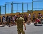Migrants in Spain's Ceuta enclave escorted back to Morocco – video