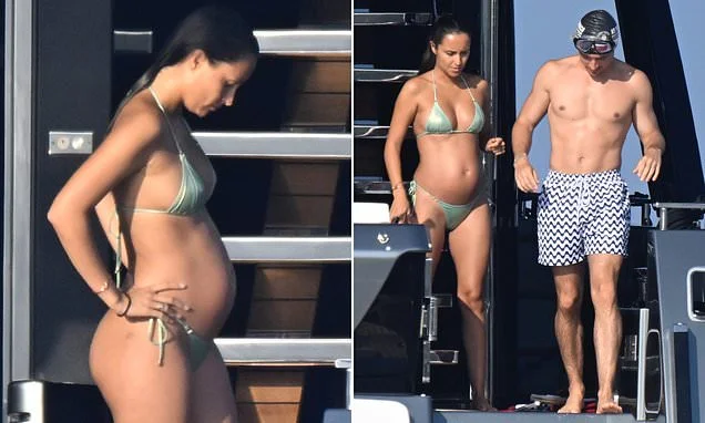 Charles Leclerc's wife Alexandra shows off 'baby bump' in a green metallic bikini as she joins him on board his £15million luxury yacht off the coast of Sardinia