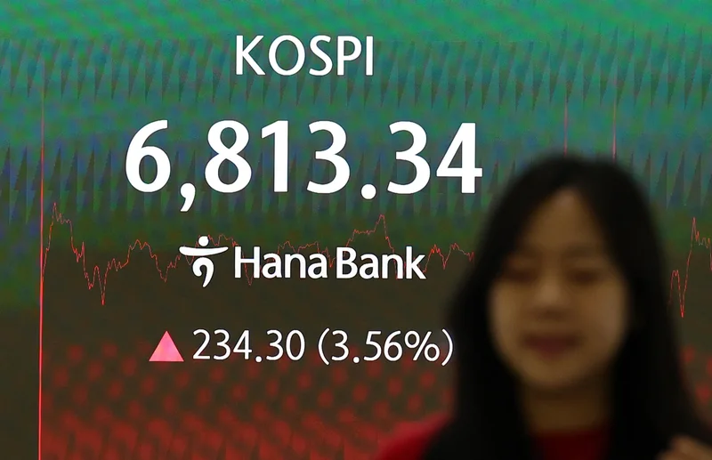 Seoul shares open sharply higher on US gains amid eased inflation woes