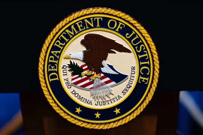 Fired federal prosecutor sues Justice Department