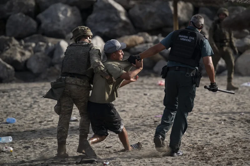 Spain puts up a 1,600-foot sea barrier between Ceuta and Morocco after EU states warn against ‘uncontrolled mass crossings’