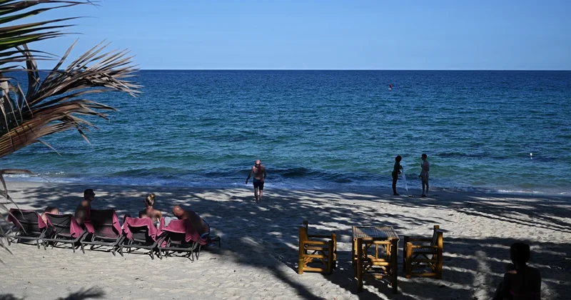 Father and young sons rescued after 16 hours stranded off Thai island