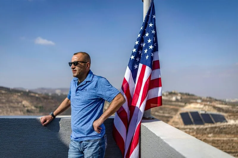 Palestinian-American hoists US flag on home besieged by settlers