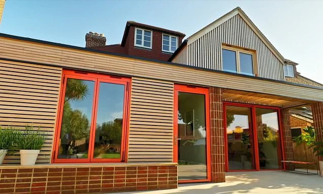 Couple spend £780,000 converting former 1930s B&B into a sleek modern three-bed home - complete with a WWII bomb shelter renovated into a glitzy bar