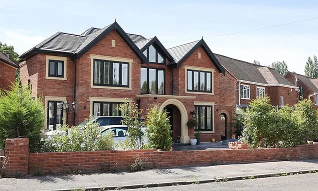 Homeowner faces having to bulldoze his £400,000 'dream' home... because it is 50cm too wide