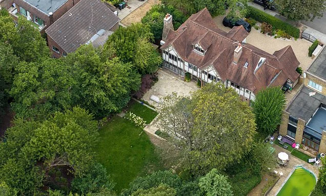 What an oasis! Liam Gallagher's north London home stays green with grass intact despite record-breaking drought - but neighbours aren't as lucky